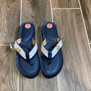 Michael Kors foam bottom/leather flip flops Sz 7